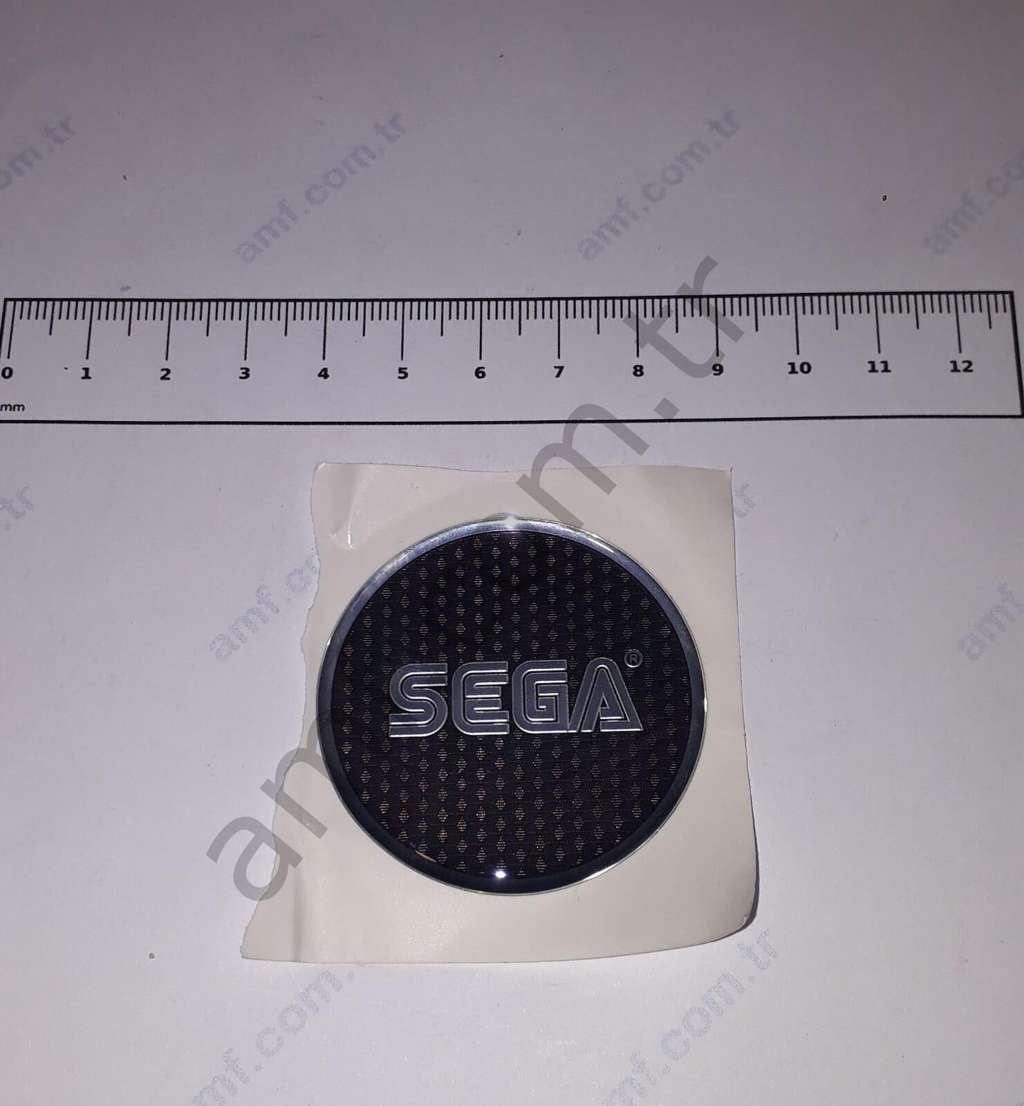 Sega Steering Emblem_RNE-2002-B ShowDown, Direksiyon Amplemi, Logosu